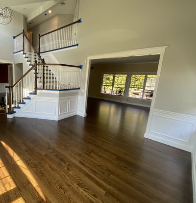 Hardwood floor & paint - high ceiling living room